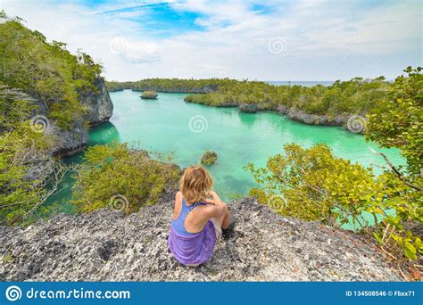 Woman Looking At Tropical Paradise Pristine Coast Line
