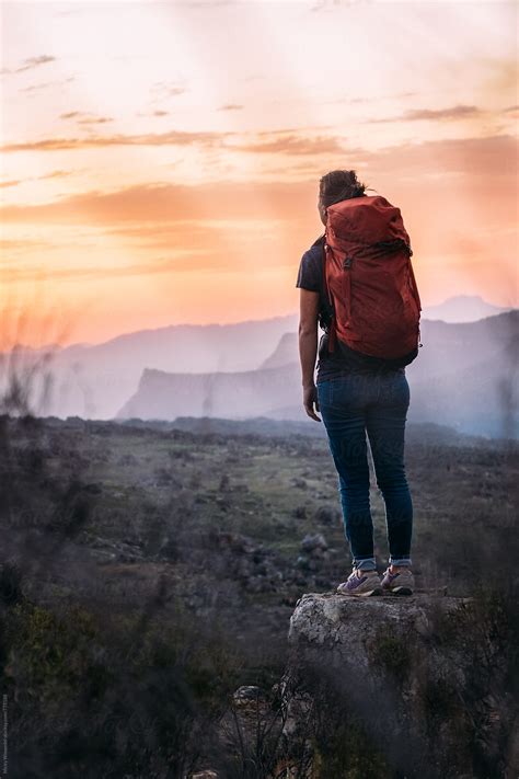 Hiker At Sunset By Stocksy Contributor Juno Stocksy