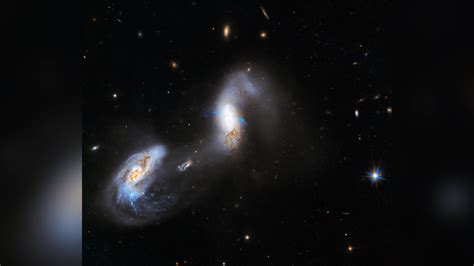 Hubble Space Telescope Captures Dazzling Image Of Interacting Galaxies