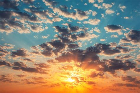 Sunset With Dramatic Sky Clouds And Sunbeams Stock Photo Image Of