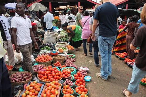 Empower Visitors Shopping In The Ugandan Marketplace The Fresh Fruit