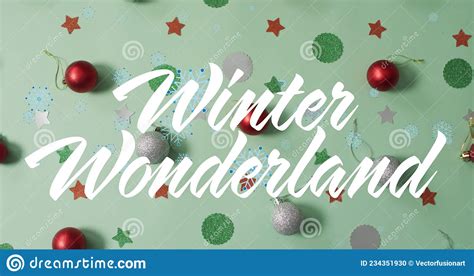Image Of Winter Wonderland Text Over Christmas Decorations Stock Photo
