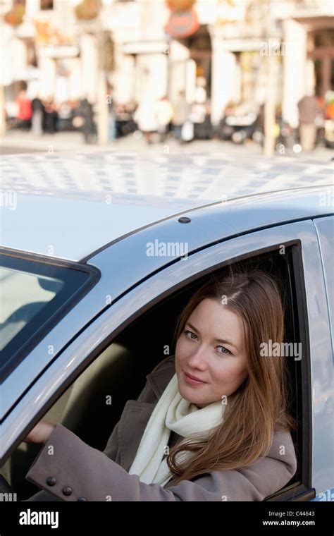 Woman Look Out Side Window Of Car Stock Photo Alamy