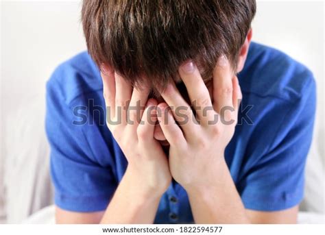 Sad Young Man Crying By Wall Stock Photo 1822594577 Shutterstock