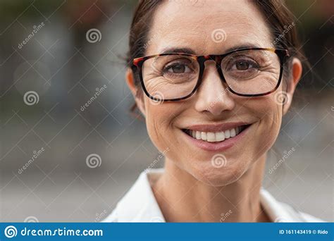 Successful Mature Woman Wearing Eyeglasses Stock Image