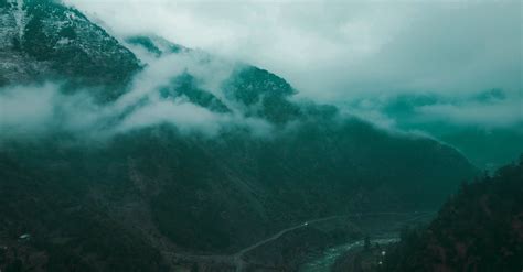 Drone Footage Of A Foggy Mountain Landscape On A Rainy Day Free Stock