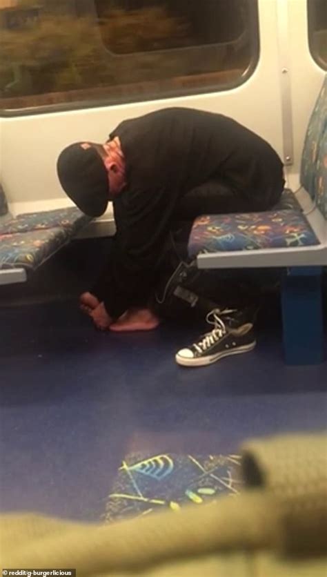 Disgusting Moment A Commuter Takes Off His Shoe And Trims His Toenails On A Train In Melbourne