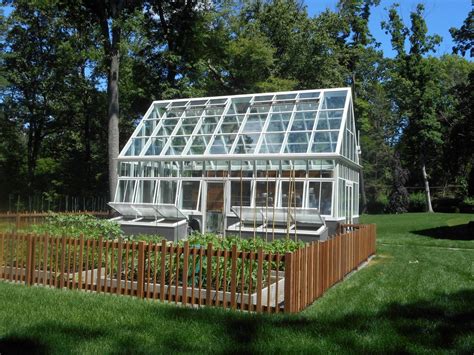 Cute Little Greenhouse With An Outdoor Garden Greenhouses