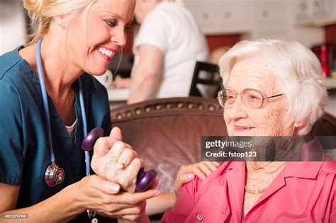 Senior Adult Patient With Home Healthcare Nurse Physical Therapy High