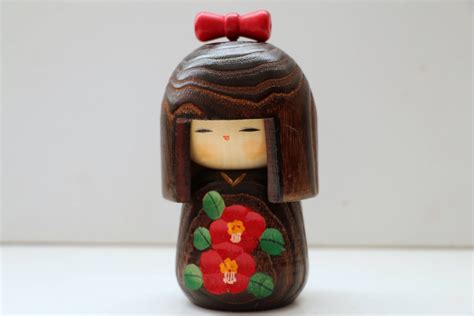 japanese wooden kokeshi doll with bow hand carved dark wood etsy kokeshi dolls kokeshi