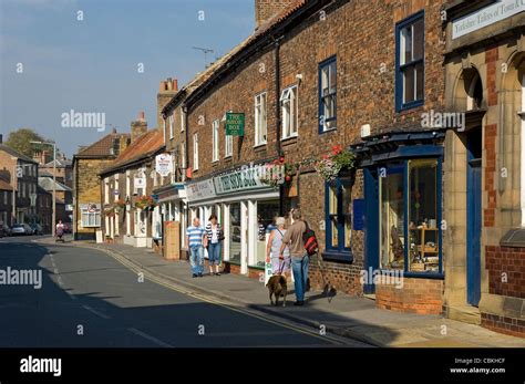 People Walking Past Shops Stores Kirkgate Thirsk North Yorkshire