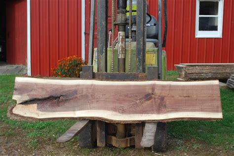 One of the most sought after solid wood among woodworkers, carpenters and furniture makers an investment in a black walnut slab is a highly personal purchase decision. Wood slab, live edge board, wide plank, wavy edge board