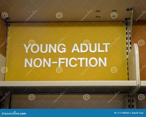 Young Adult Non Fiction Sign Top Of Library Shelf Stock Image Image