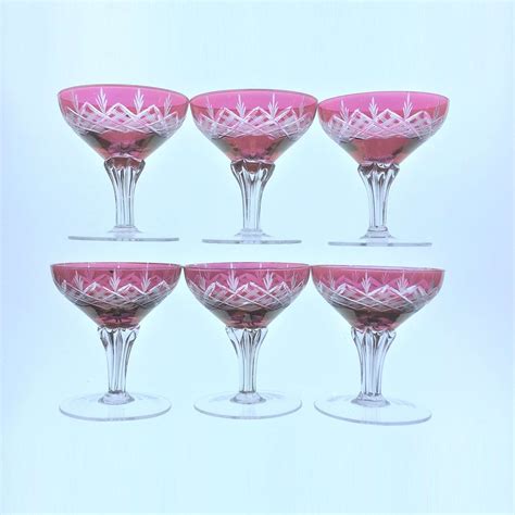 Set of 6 cut glass wine glasses or champagne coupes with floral reserves. Set of six (6) Cranberry Glass Cut to Clear Crystal ...