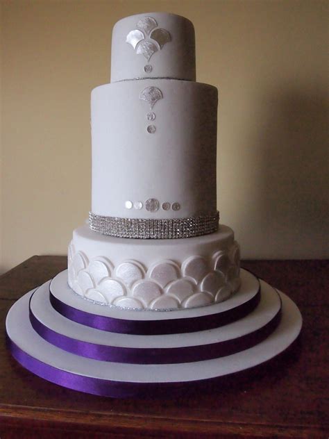 Learn how to make a wedding cake for your big day in this helpful article. Gatsby Inspired 3 Tier Wedding Cake - CakeCentral.com