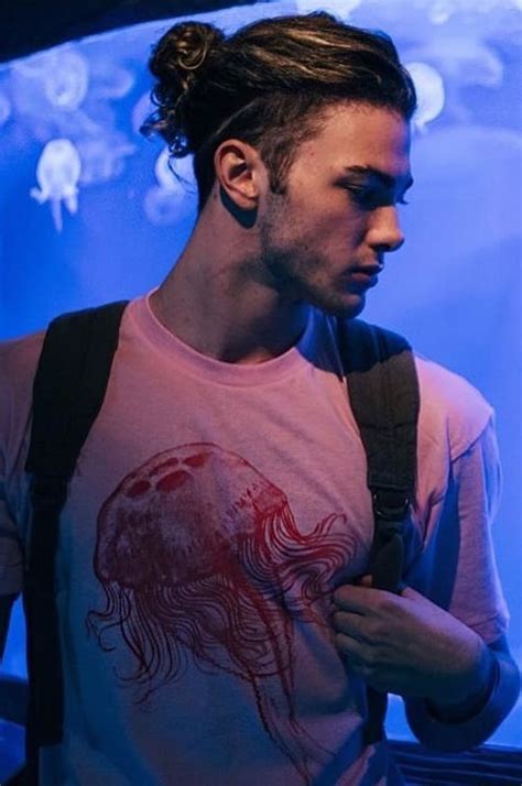 Curly messy undercut with mid fade hairstyle. 2 Trendy Undercut Man Bun Hairstyle | Men's Hairstyle Guide