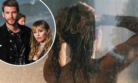 miley cyrus sings revenge song flowers naked in the shower in eye popping video daily mail