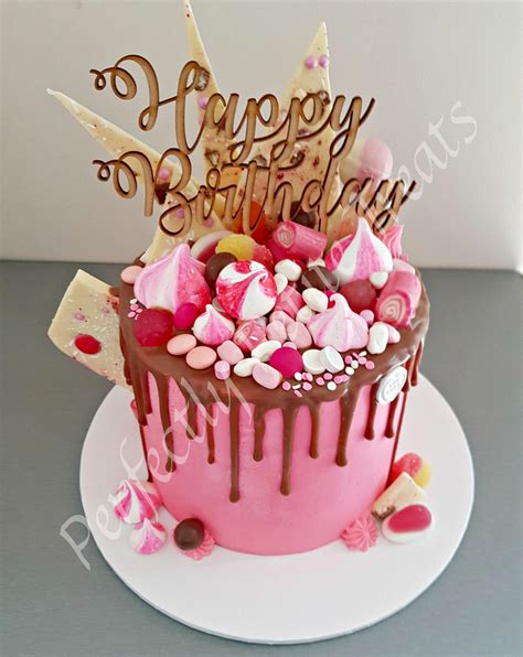 Pink And Chocolate Lolly Drip Cake With Layers Of White Velvet Cake And