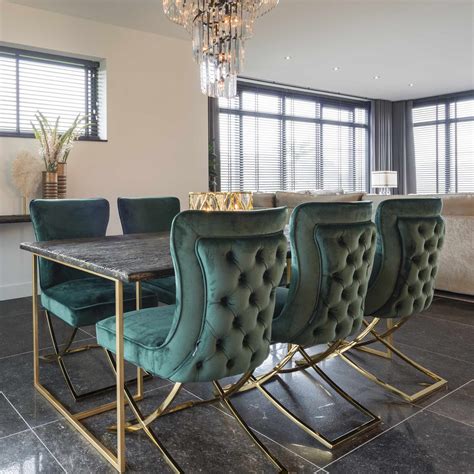 A wide catalogue of upholstered chairs, in leather or fabric, plastic academy is an elegant modern dining chair in faux leather. Green Velvet Modern Dining Chair - Juliettes Interiors
