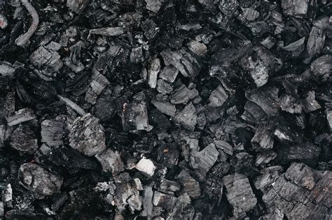 Backdrop Of Burnt Coal With Rugged Surface · Free Stock Photo