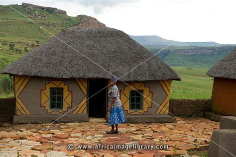 Photos And Pictures Of Sotho Woman In Front Of Hut