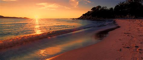 2560x1080 Sea Sunset Beach Sunlight Long Exposure 4k 2560x1080