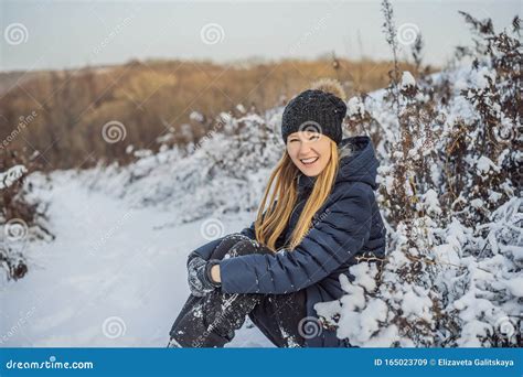 Enjoying The First Snow Young Woman Outdoors On A Lovely Forest Path