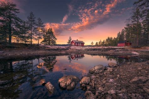 Photographer Captures A Mesmerizing Lakeside Red Cabin In Different