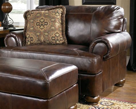 I found it online but. Reverse Auction - Ashley Furniture Axiom Walnut Leather ...