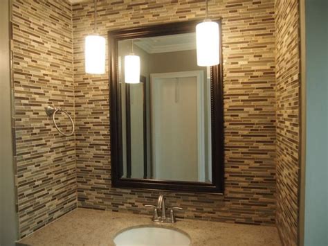 Glass mosaics are one of the easiest ways to add pops of color shine and shape to your shower recessed shelf or backsplash. Glass tile accent wall in a powder room | Bathrooms ...