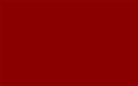 It is sometimes used to mark things that are wrong, important or dangerous. 1440x900 Dark Red Solid Color Background