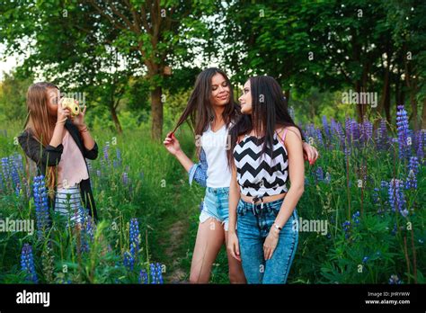 Three Hipsters Girls Blonde And Brunette Taking Self Portrait On