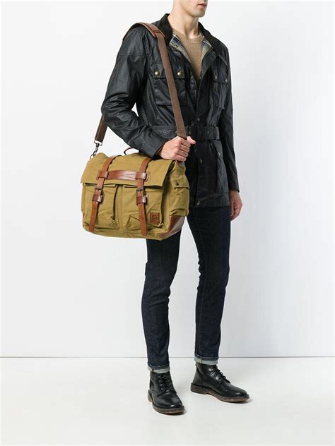 A container of flexible material, such as paper, plastic, or leather, that is used for carrying or. Belstaff Leather Colonial Messenger Bag in Brown for Men ...
