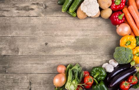 Use them in commercial designs under lifetime, perpetual & worldwide rights. Vegetables on wood background — Stock Photo © primopiano ...