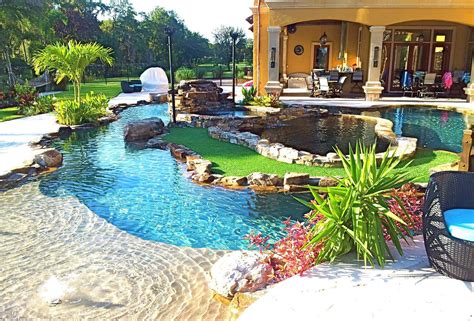 Backyard Oasis Lazy River Pool With Island Lagoon And Jacuzzi In The