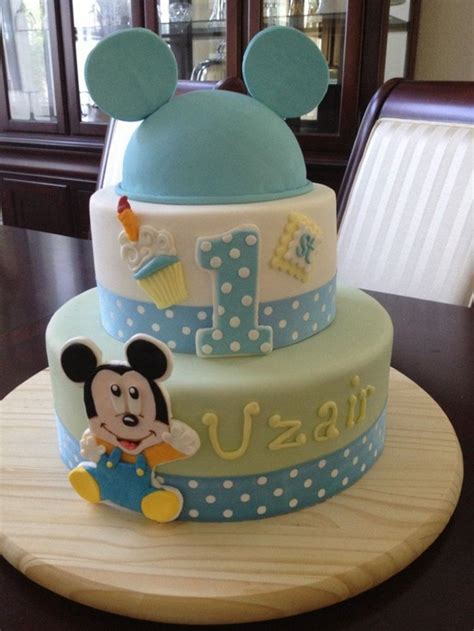 I first found an 8x10 photo of mickey and started sketching to make this mickey cake, first i made a 1 kg round shape cake and, i cut micky's ears from another materiel because that cake was not enough. Mickey Mouse 1st Birthday Cake Ideas | Boys first birthday ...