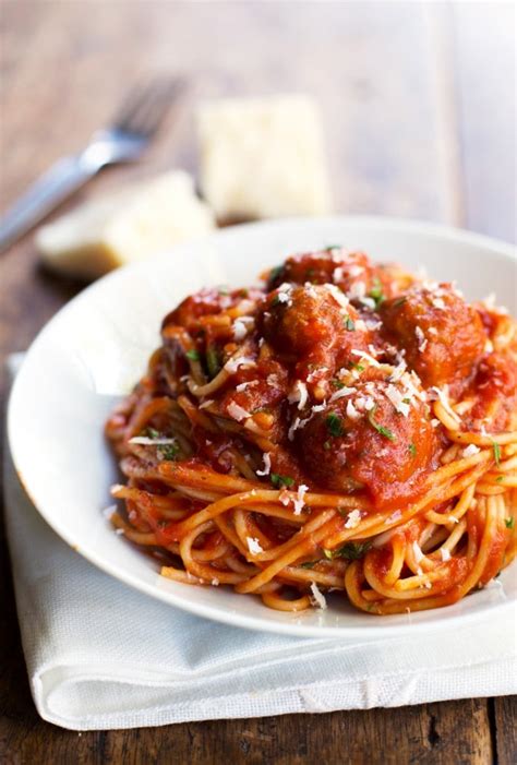 Stir in the spaghetti sauce, water and spaghetti; Lighter Spaghetti and Meatballs - Swanky Recipes