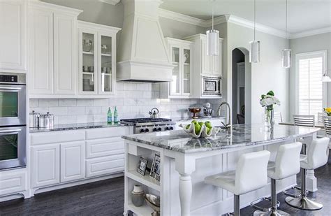 The white upper cabinets combined with the white subway tile keeps things feeling open and airy. Gray Granite Countertops - Contemporary - kitchen - EJ ...