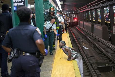 Man Paces On Nyc Subway Tracks Holds Up Trains