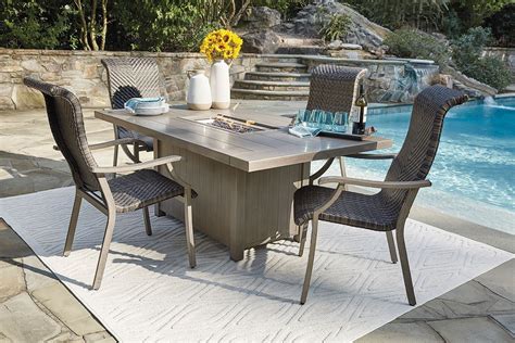 Windon Barn Outdoor Fire Pit Table Set By Signature Design By Ashley