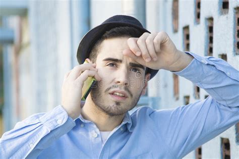 Man With Mobile In The Wall Stock Photo Image Of Cellphone