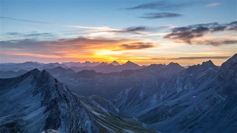 Download 1366x768 Wallpaper Sunset Horizon Mountains