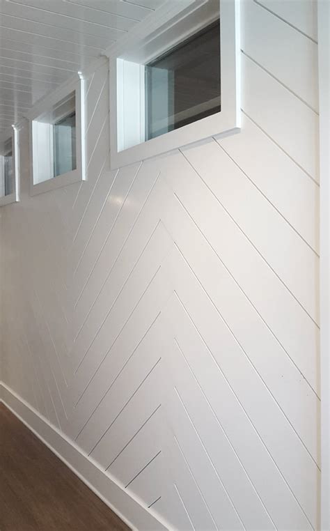 If you're covering the whole wall, place the level line halfway up the wall. Herringbone Shiplap in the Showroom - WindsorONE
