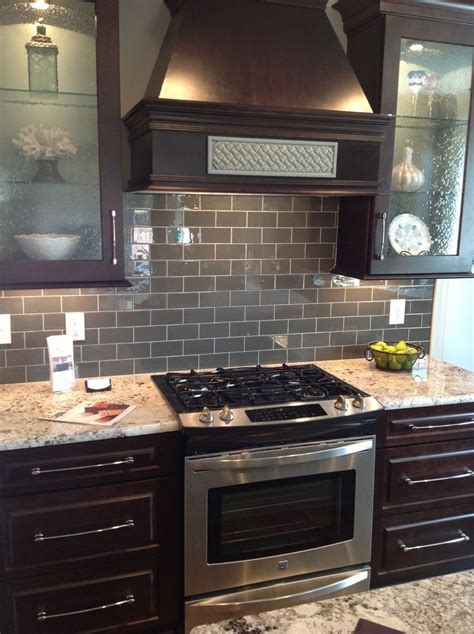 Update your kitchen storage with stock cabinets at lowe's. I like the dark cabinets with light countertops. I would ...