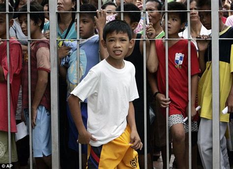 He S Smiling Now Filipino Youths Wait In Line To Take Part In Mass Circumcision Party World