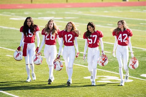 victoria s secret angels playing football video glamour