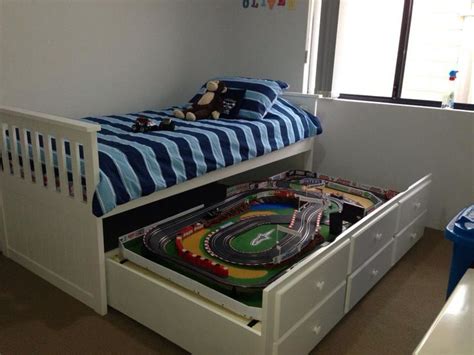 [this is day 7 in a 31 day series called 31 days to an. My awesome husbands handy work to make this bed race track for our 4yo race car mad little boy ...
