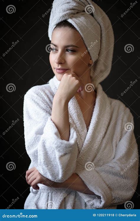 Young Woman In A Bathrobe And Towel On Her Head Spa And Care Portrait