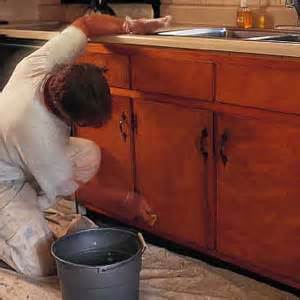 Fill any cracks, crevices or previous hardware holes with wood filler. Painting Kitchen Cabinets | LKN Cabinets