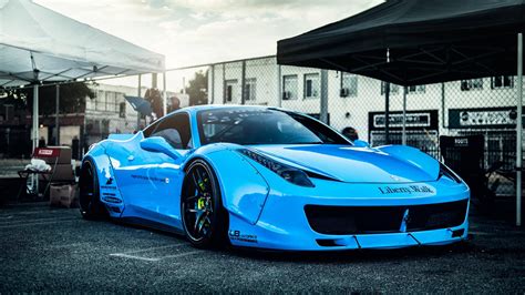 Download Blue Ferrari Racing Car Wallpaper